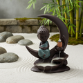 Figurine Bouddha sur fond zen